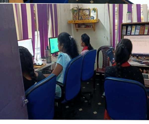 Team members working at the SK Agencies office